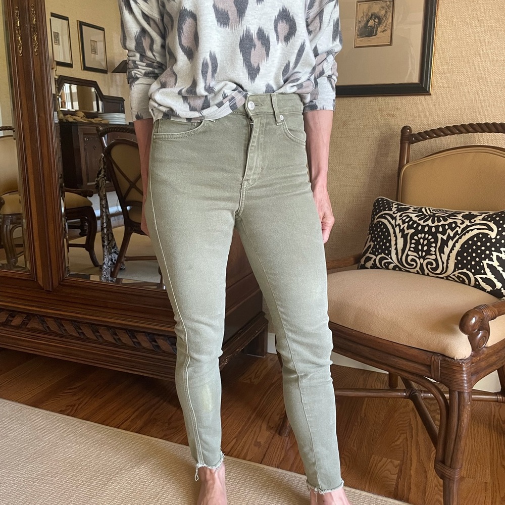 Free People High Waisted Skinny jeans, size 26.  Original raw hem.  Olive color.